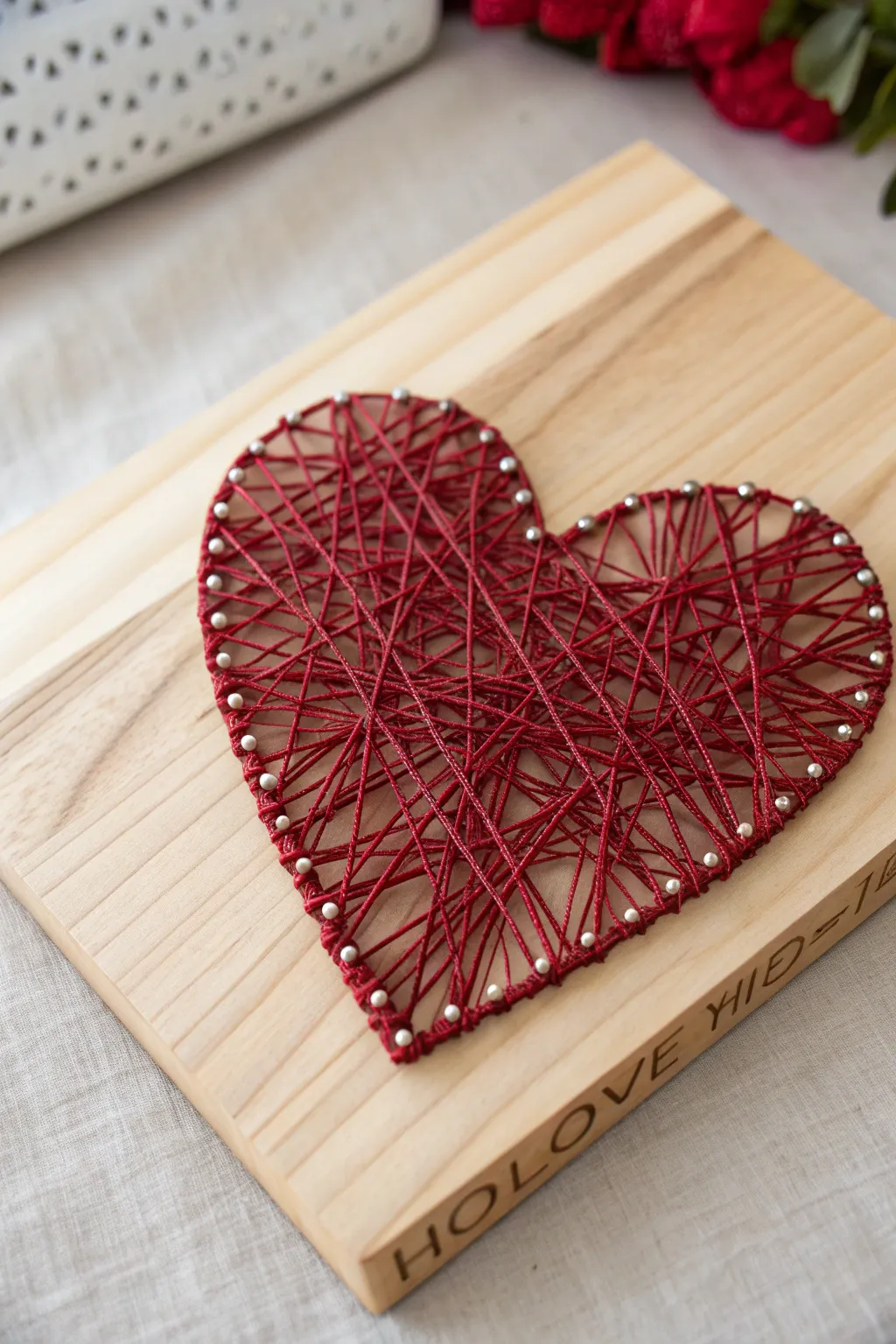 Craft your heart out: Add a touch of love and elegance to your home with minimalist Valentine's Day string art.