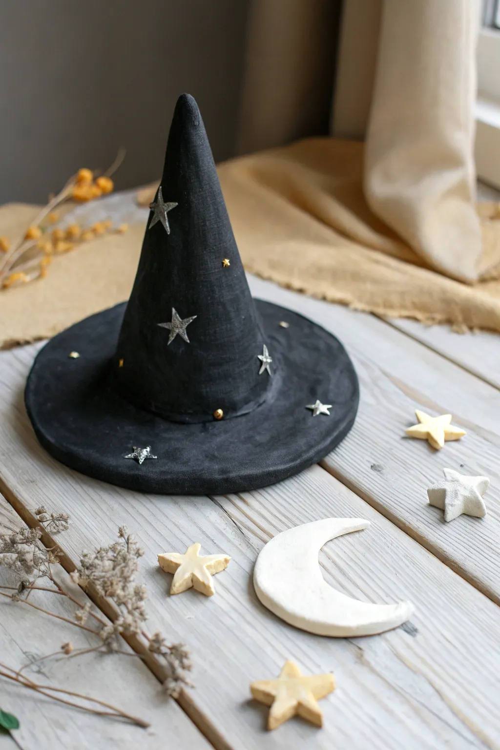 Add a touch of magic to your decor with this minimalist witch hat, perfect for a cozy Halloween vibe.
