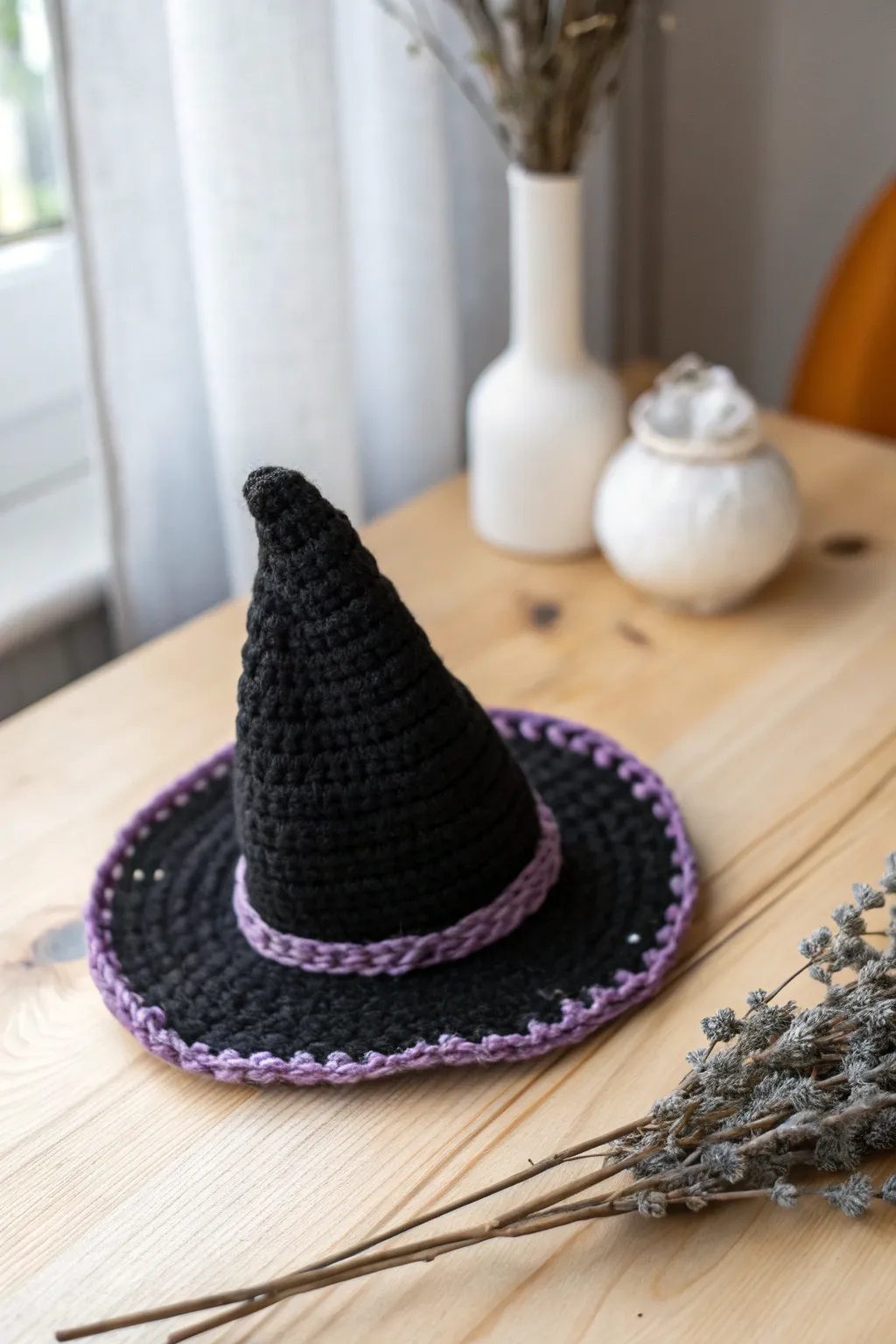Enchant your space with a touch of handmade magic – the perfect mini witch hat for a charming Halloween vibe.