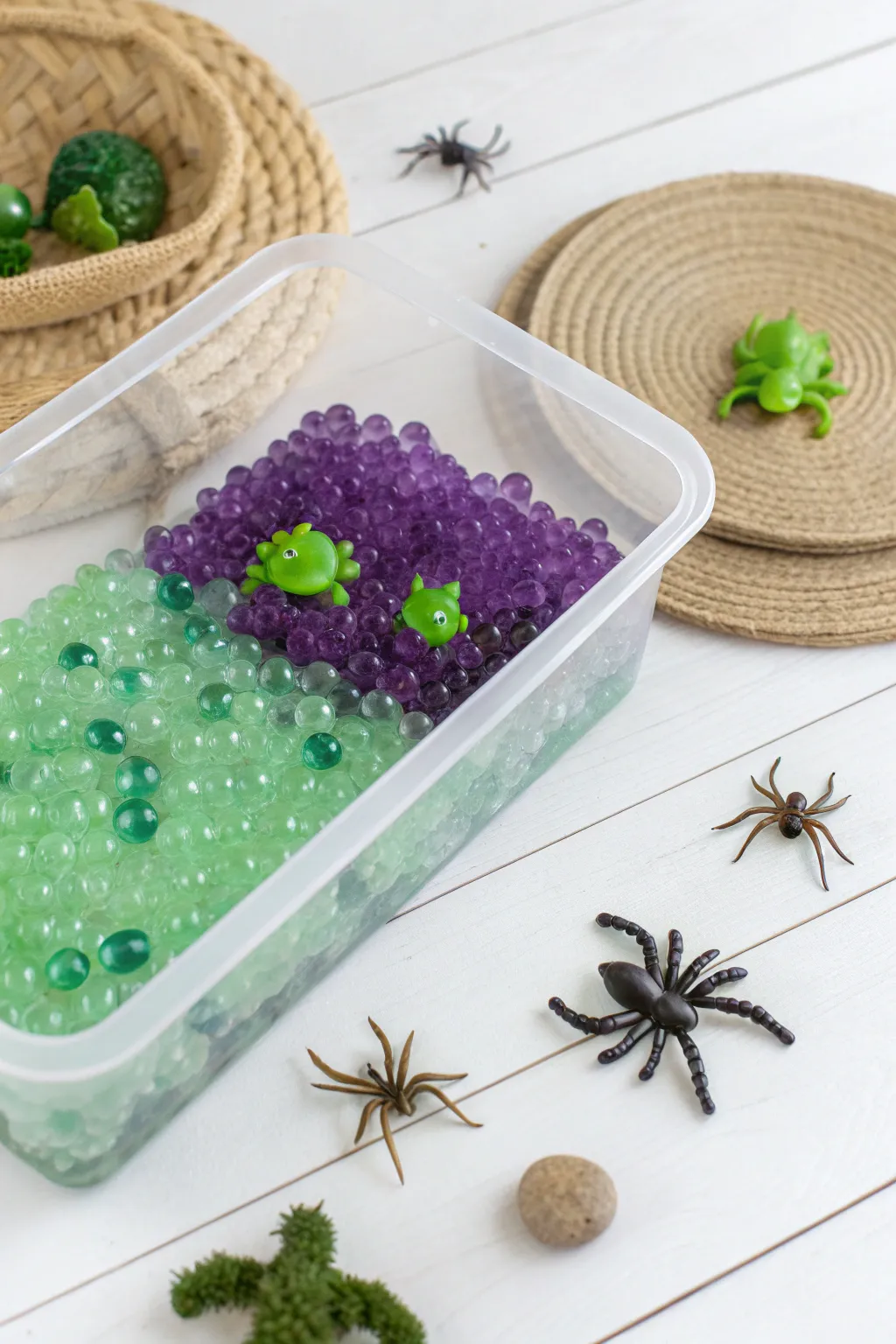 Dive into the enchanting world of a Witch's Brew with this minimalist sensory bin, perfect for a touch of Halloween magic!