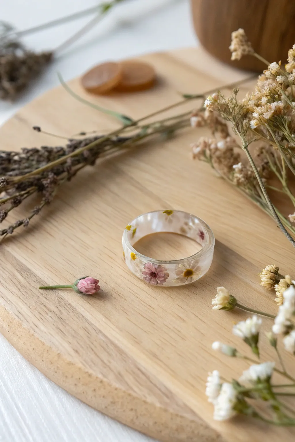 Capture nature's elegance with a resin pressed flower ring—wear a piece of your garden.