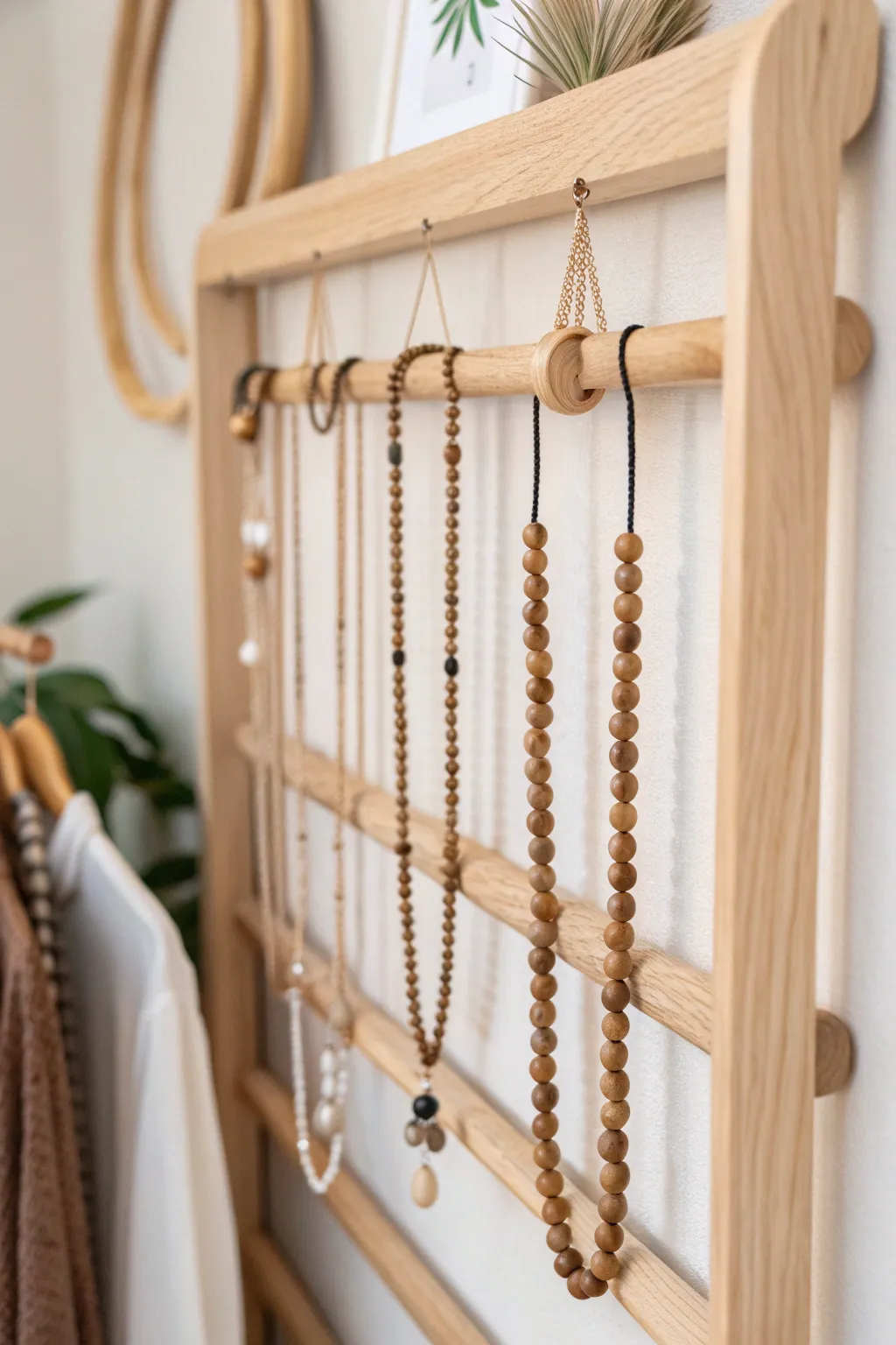 Organize and showcase your necklaces with minimalist elegance. 🌿✨ #JewelryStorage #ScandinavianStyle #BohoChic
