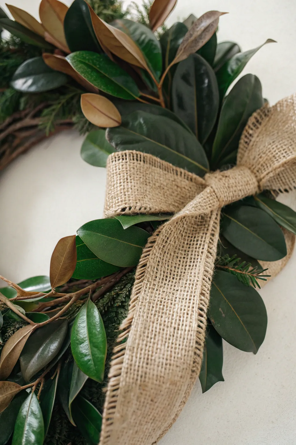 Embrace the elegance of nature with a Magnolia and Burlap Blend wreath.