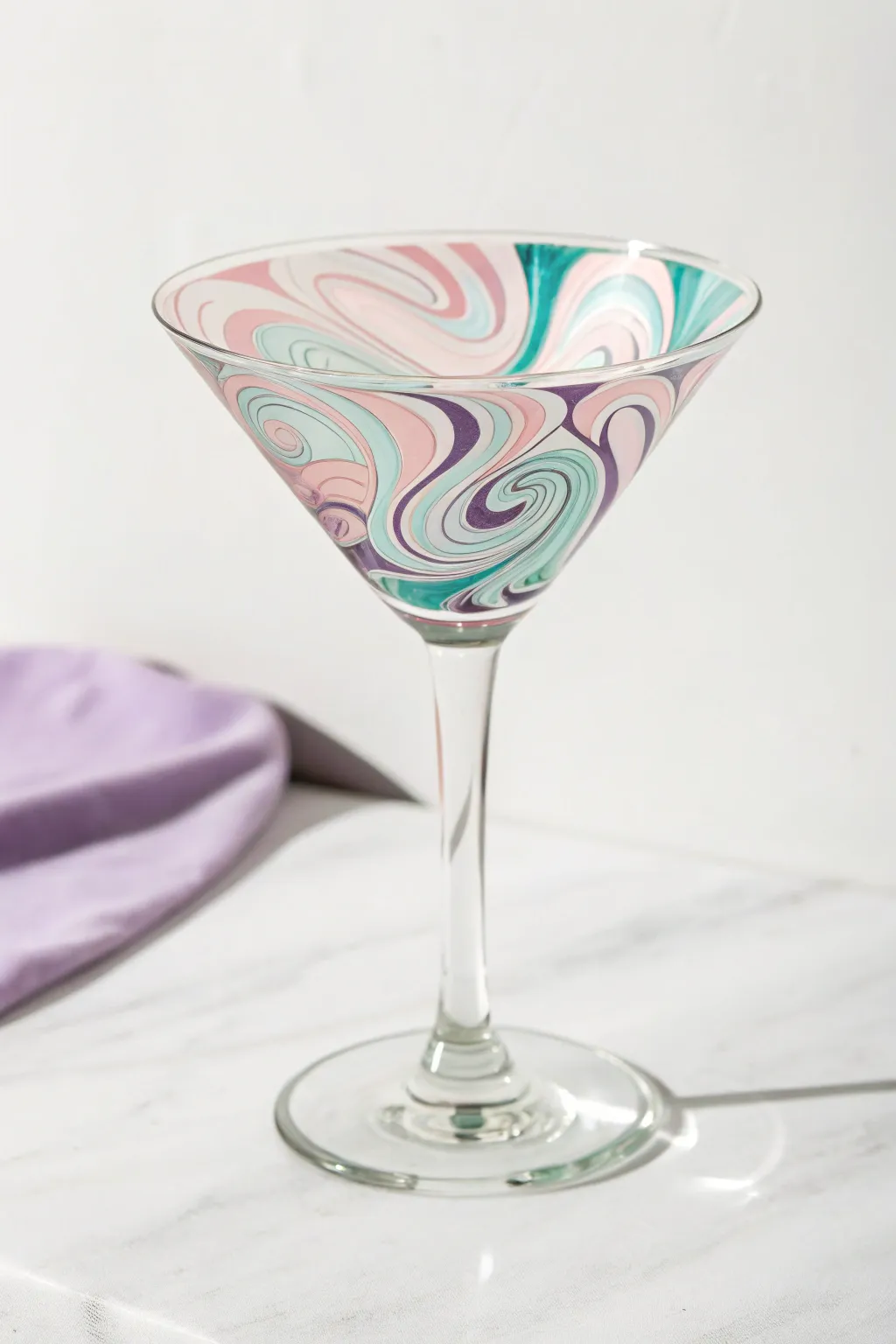 Transform your glass cabinet into an art gallery with swirls of color and elegance.