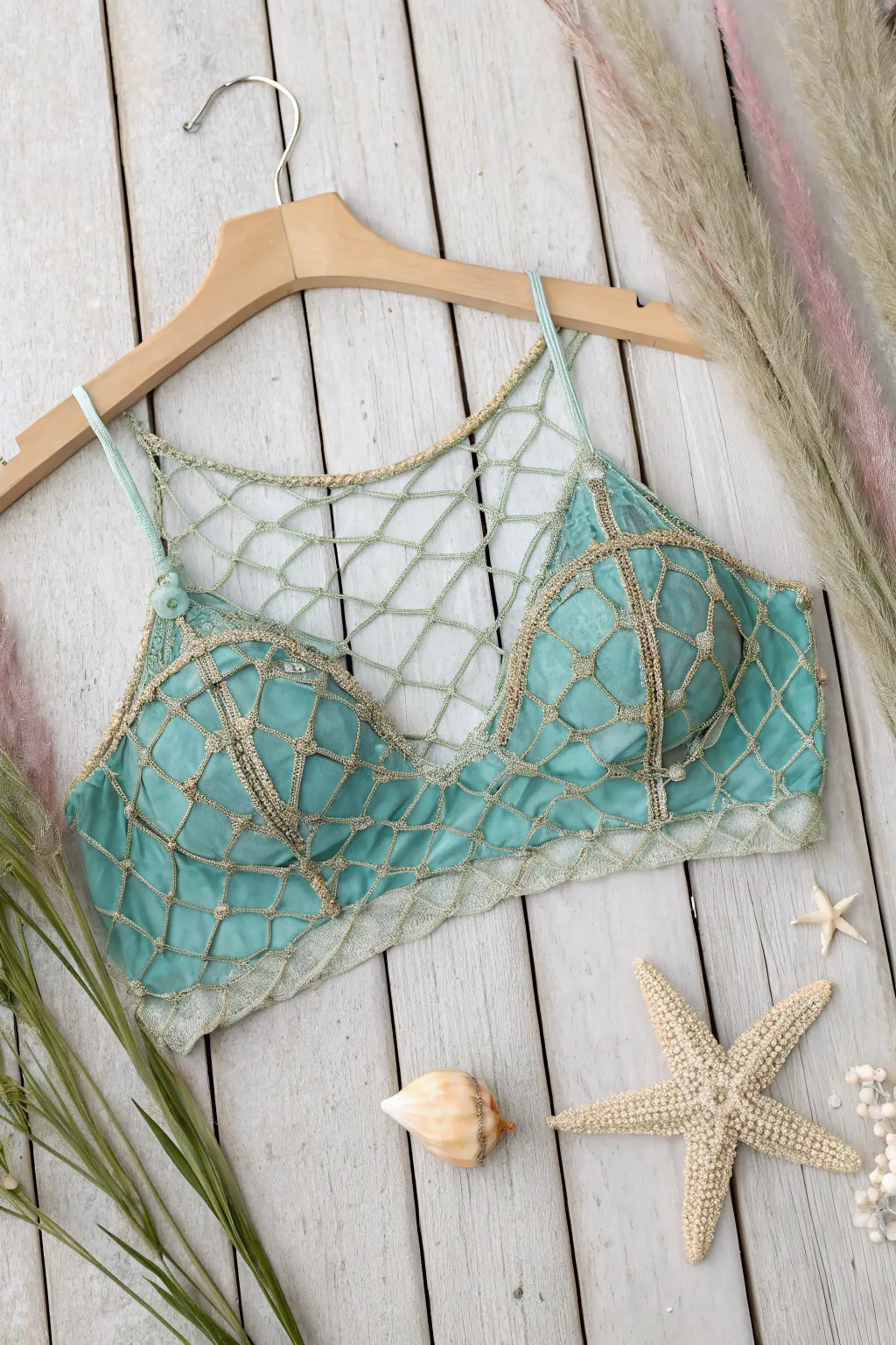 Dive into elegance with this netted mermaid top, where simplicity meets the sea's natural grace.
