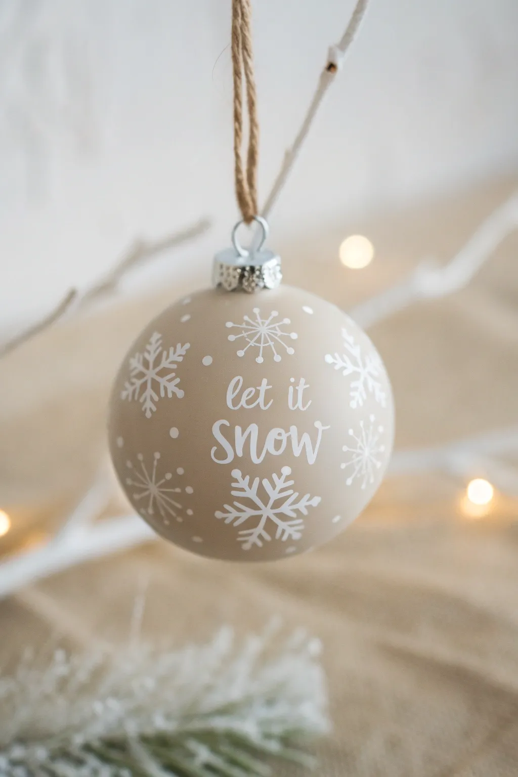Embrace the serene beauty of winter with our 'Let it Snow' handcrafted ornament.