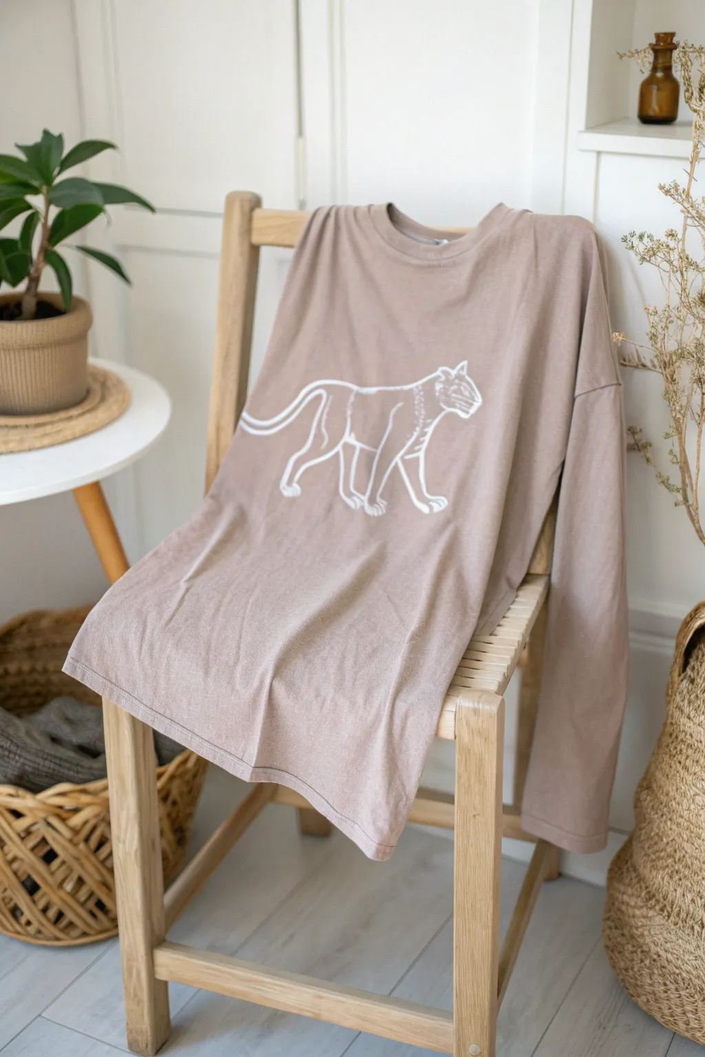 Embrace the allure of subtlety with this chic panther silhouette tee – perfect for a touch of mystery in your minimalist wardrobe.