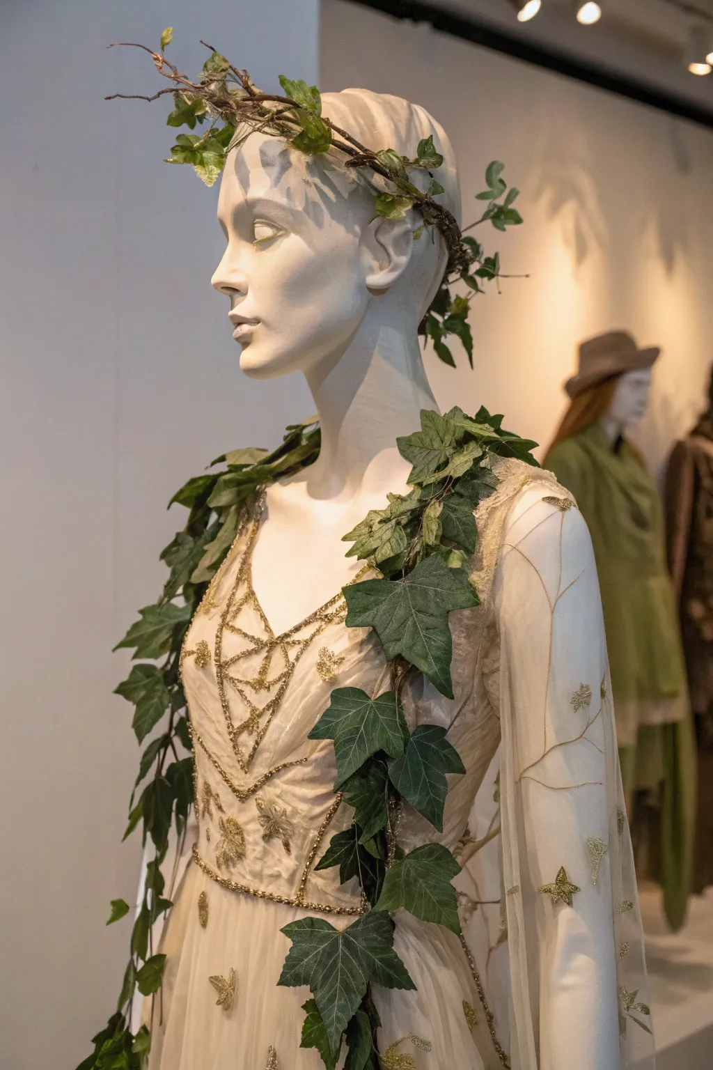 Embrace nature's elegance with a stunning leafy ensemble this Halloween. 🍃 #MinimalistCostume #BohoChic