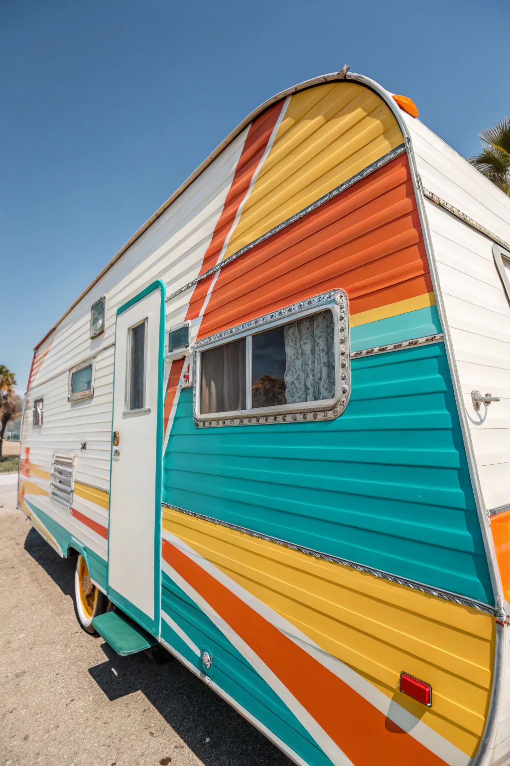 Revive the spirit of the 70s with vibrant retro stripes on your camper!