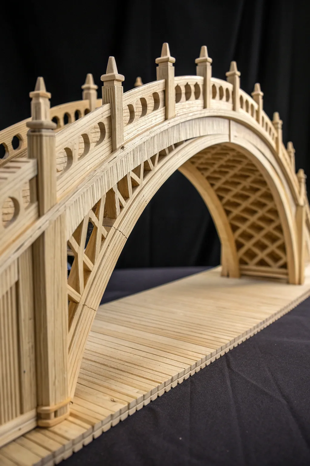 Witness the beauty of craftsmanship with this stunning popsicle stick arch bridge, where elegance meets engineering.