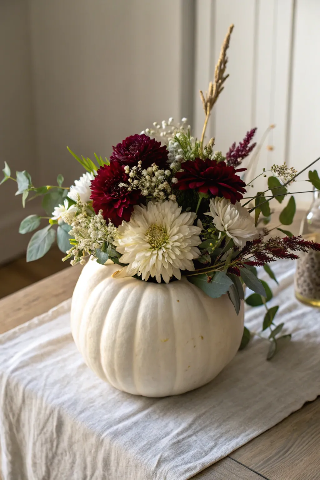 Elevate your fall decor with this stunning pumpkin floral arrangement—where simplicity meets natural elegance.