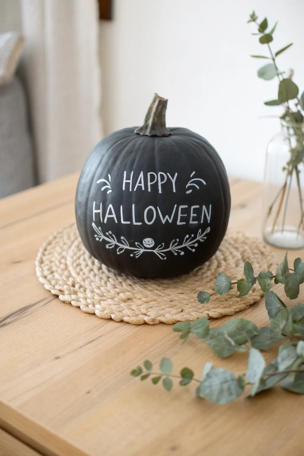 Get creative with your pumpkin decor: Chalkboard messages bring a touch of elegance to Halloween!