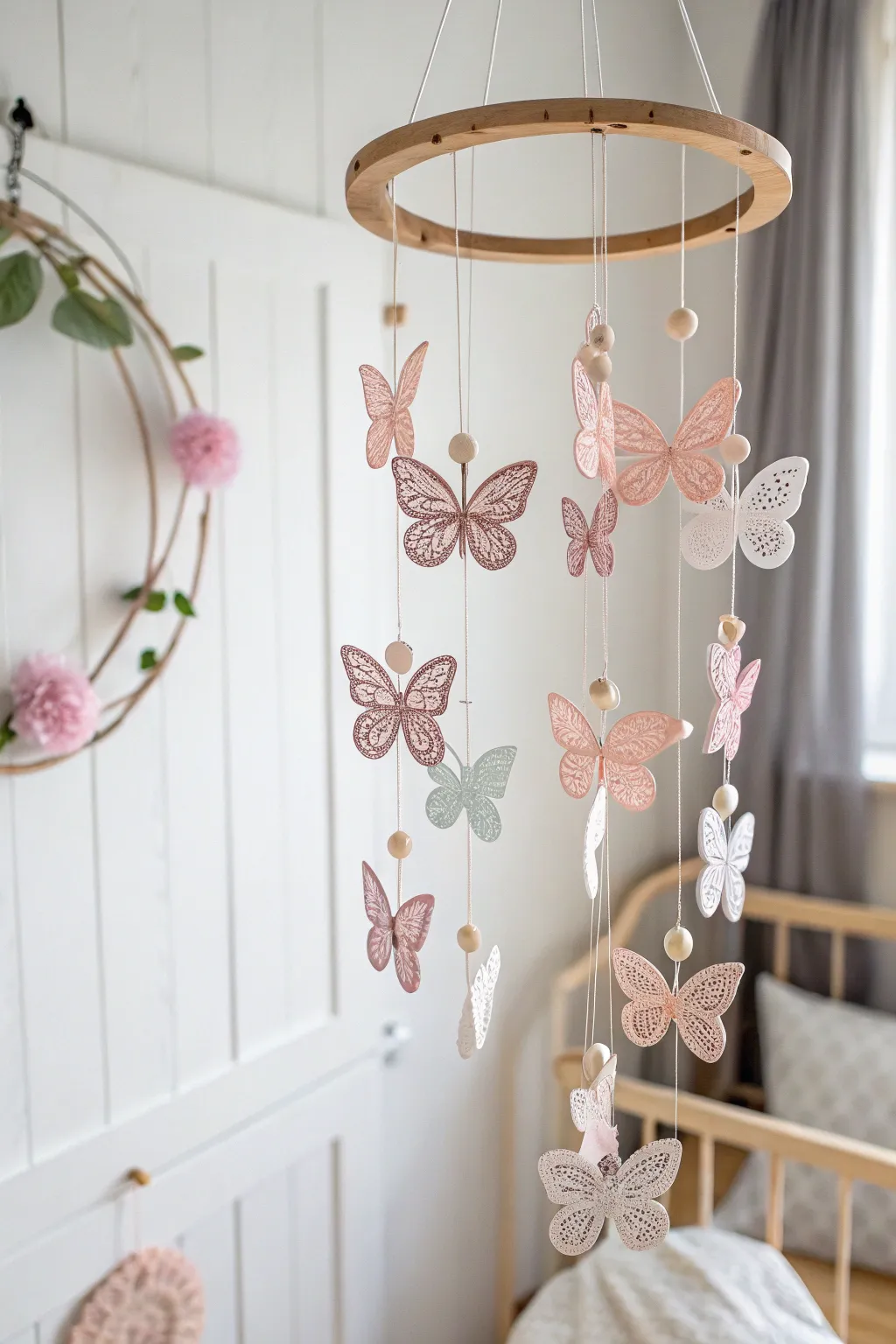 Elevate your nursery with the enchanting beauty of a quilled butterfly mobile, where craftsmanship meets minimalist elegance.