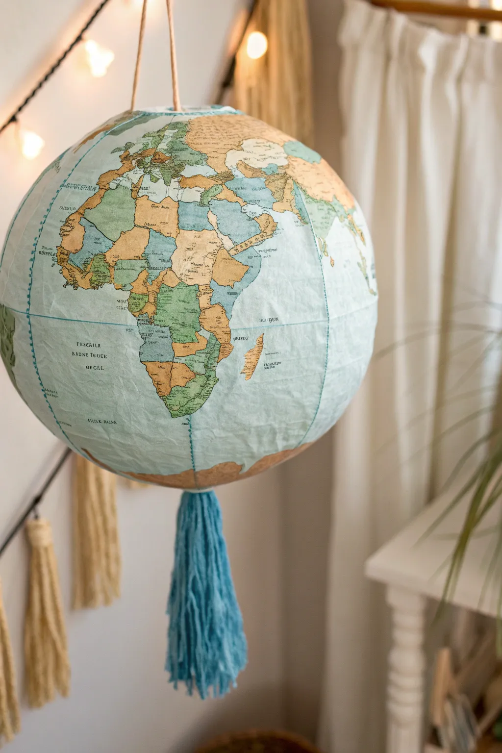 Embark on an adventure with this elegant globe piñata – perfect for a travel-themed celebration!