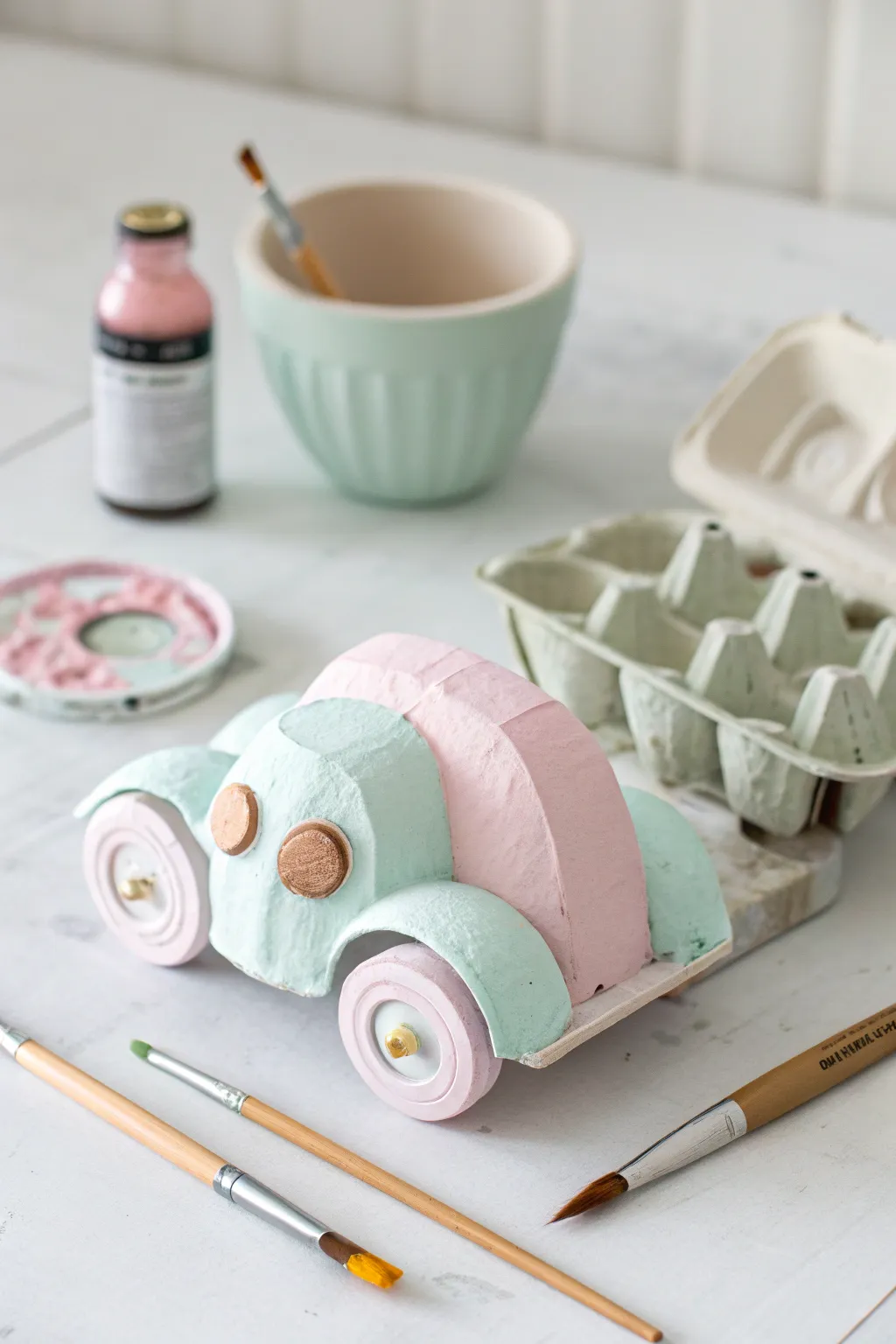 Charming egg carton car: where simplicity meets creativity in a child's world.
