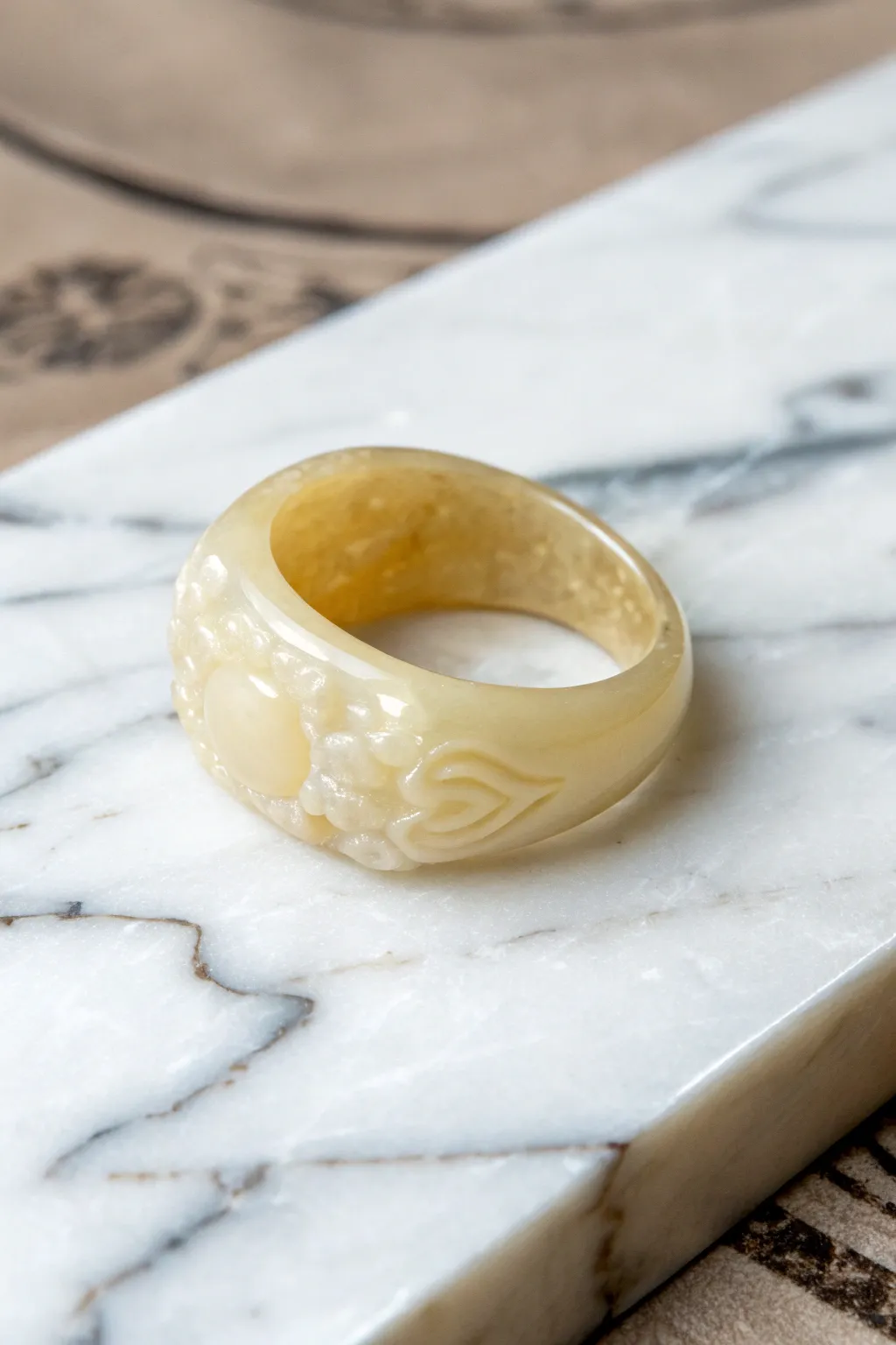 A whimsical cloud-shaped wax ring design.