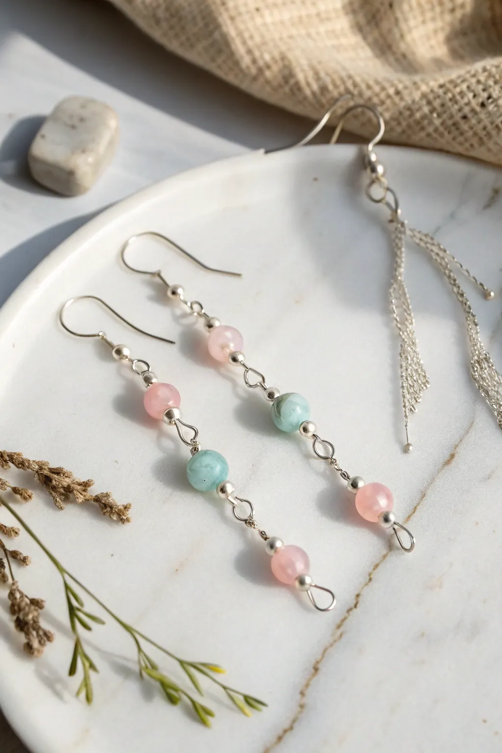 Elevate your style with these charming handcrafted dangle earrings, where minimalist elegance meets a playful pop of color.