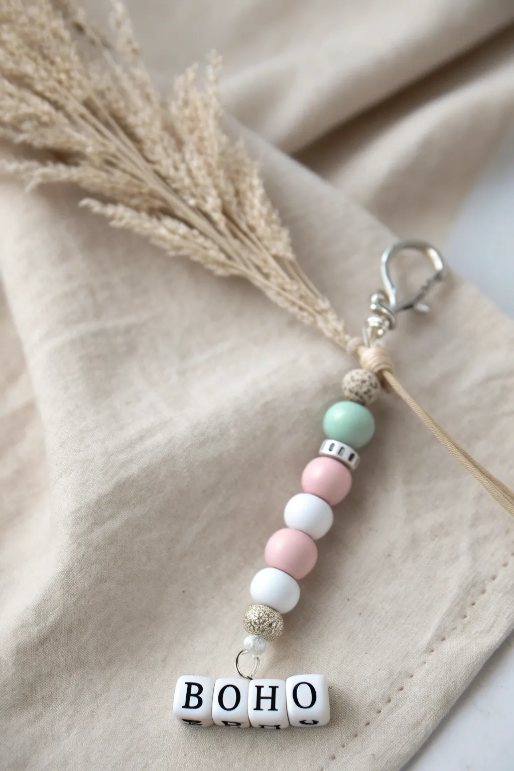 Add a personal touch to your phone with a chic clay bead charm featuring your initials. Perfect for expressing your unique style!