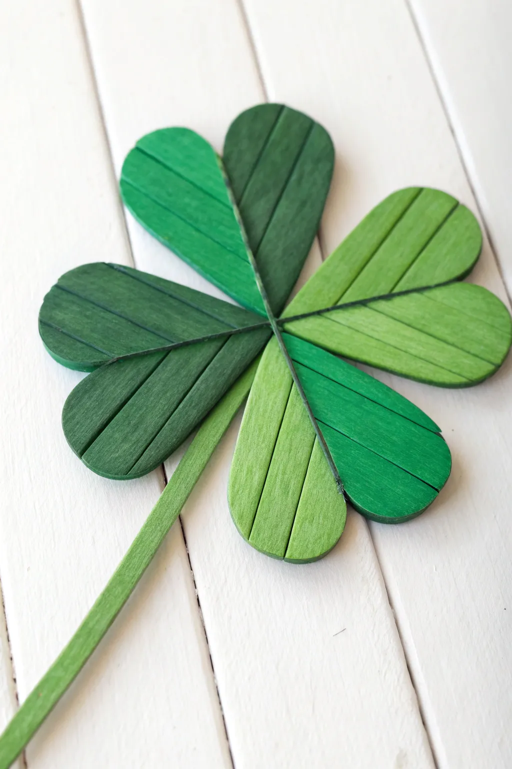 Embrace creativity with these charming popsicle stick clovers – where simplicity meets vibrant elegance.