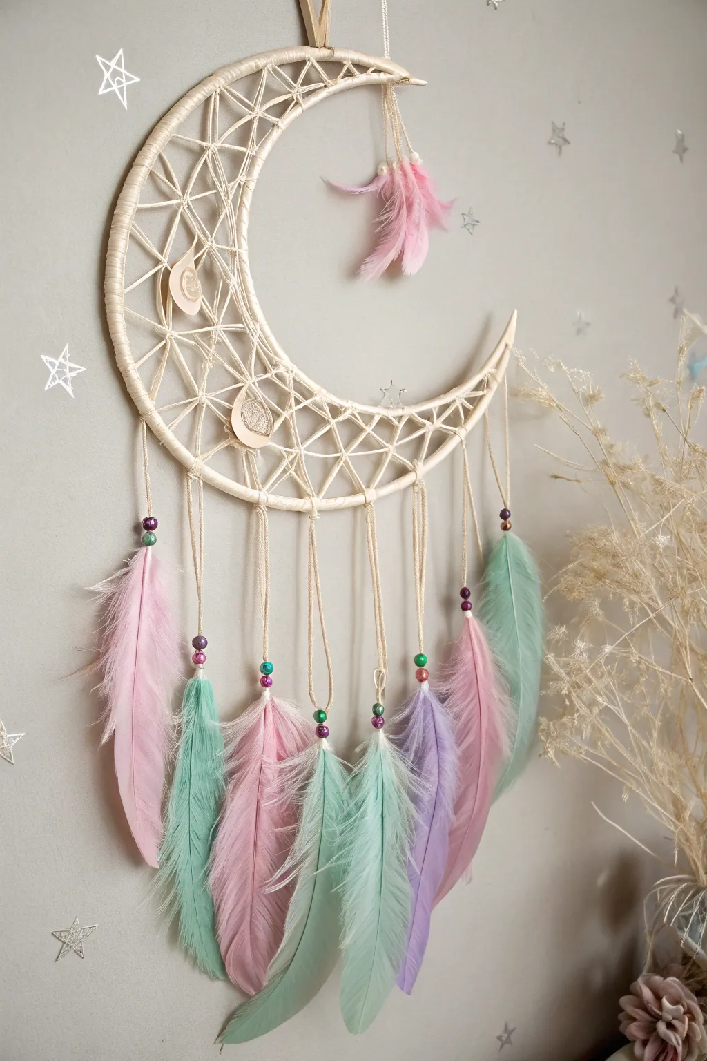 Embrace the serene beauty of the night with this Crescent Moon Dream Catcher, a perfect blend of simplicity and whimsy.