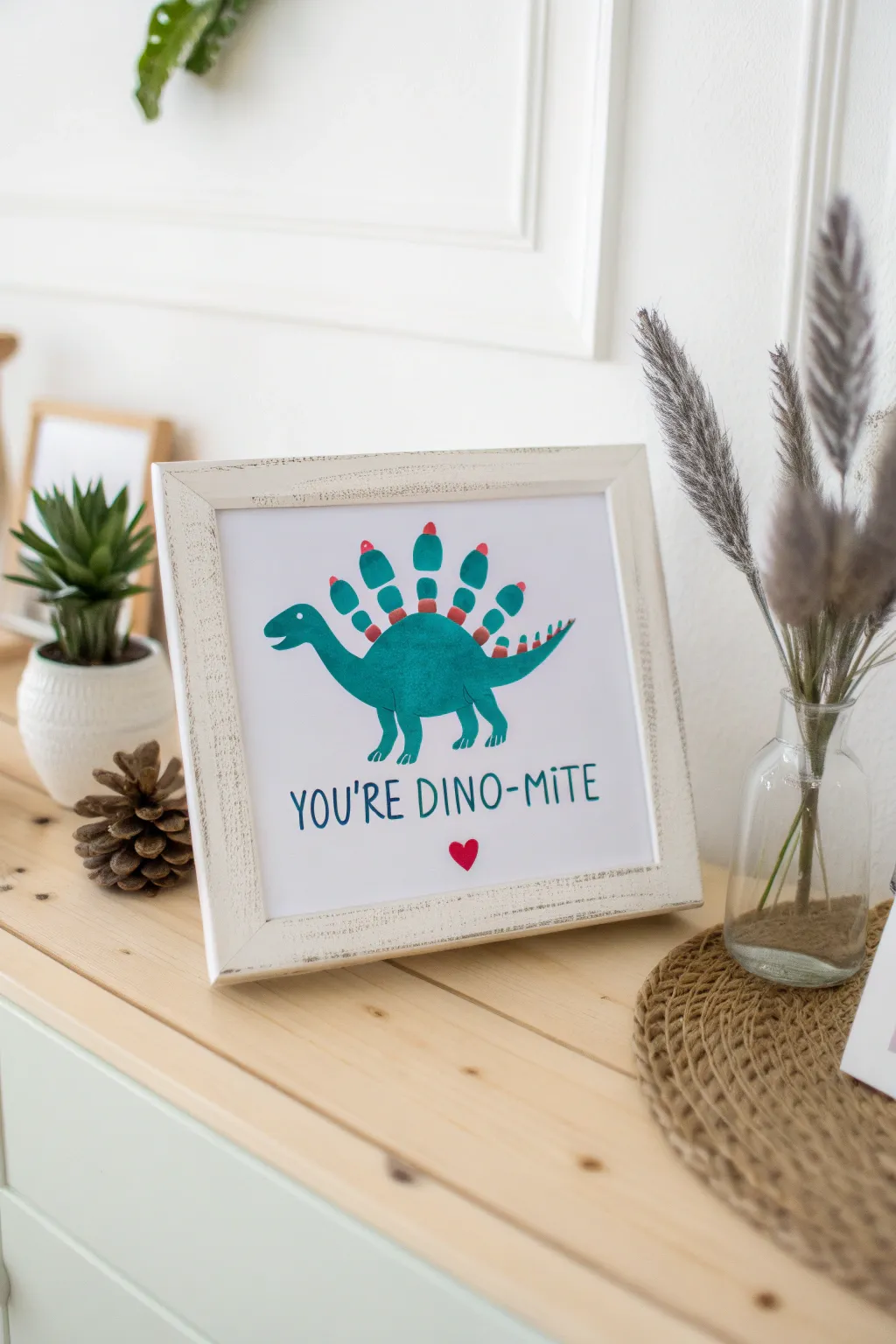 Unleash your creativity with this delightful Dino-mite handprint art!