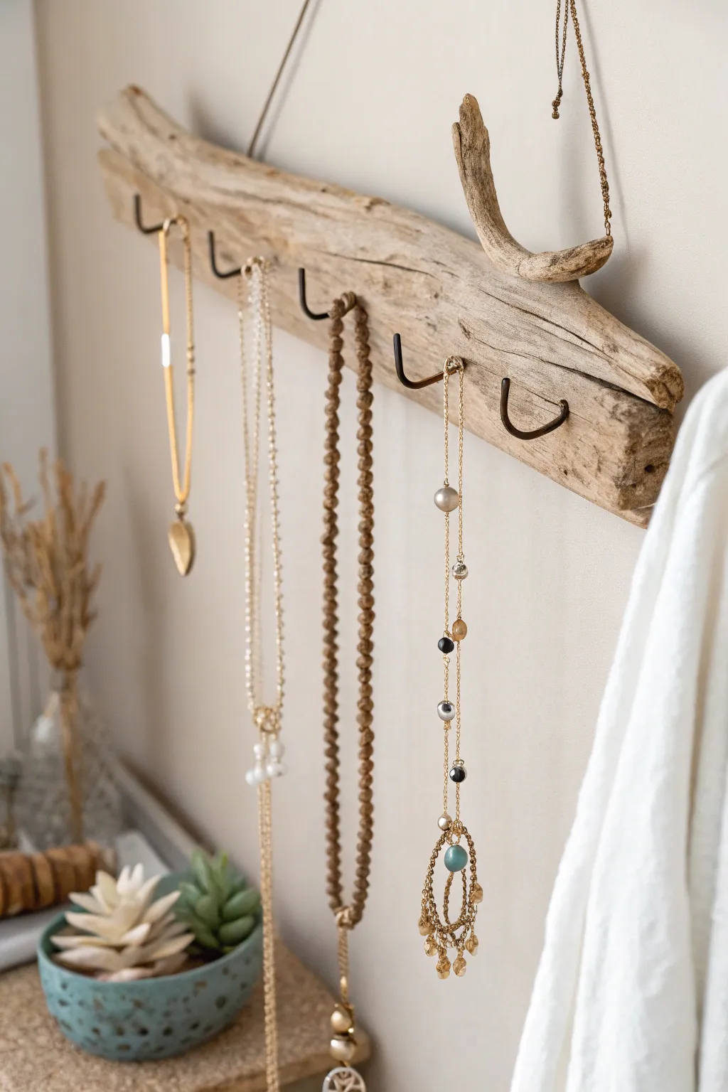 Transform your space with a rustic driftwood jewelry rack, where simplicity meets natural elegance.