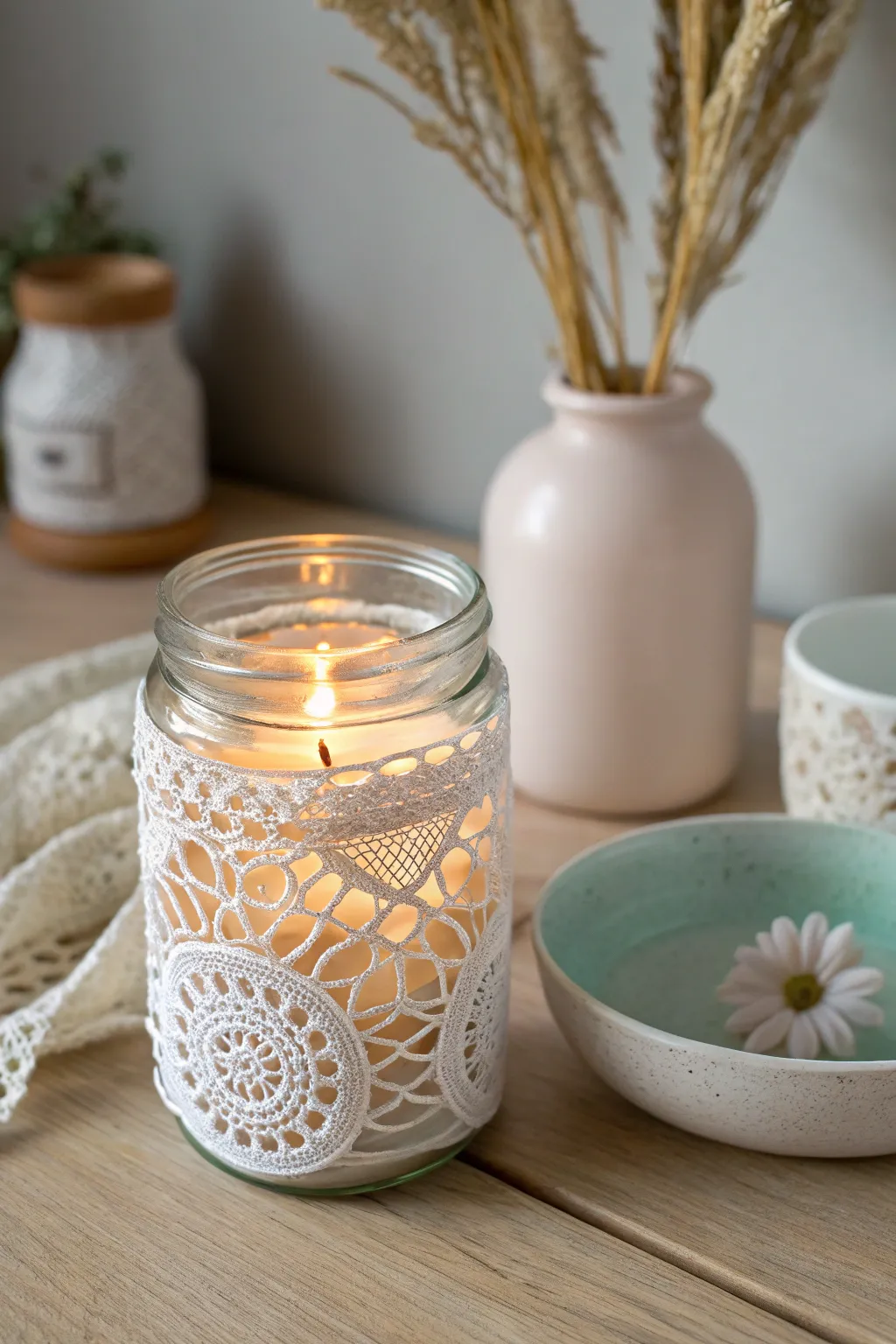 Illuminate your space with Scandinavian elegance: Doily-infused candle holders for a touch of boho warmth.