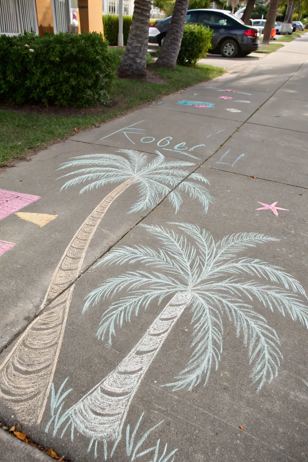 Dreaming of a Tropical Getaway? Let these chalk-drawn palm trees transport you to your own beachside paradise!