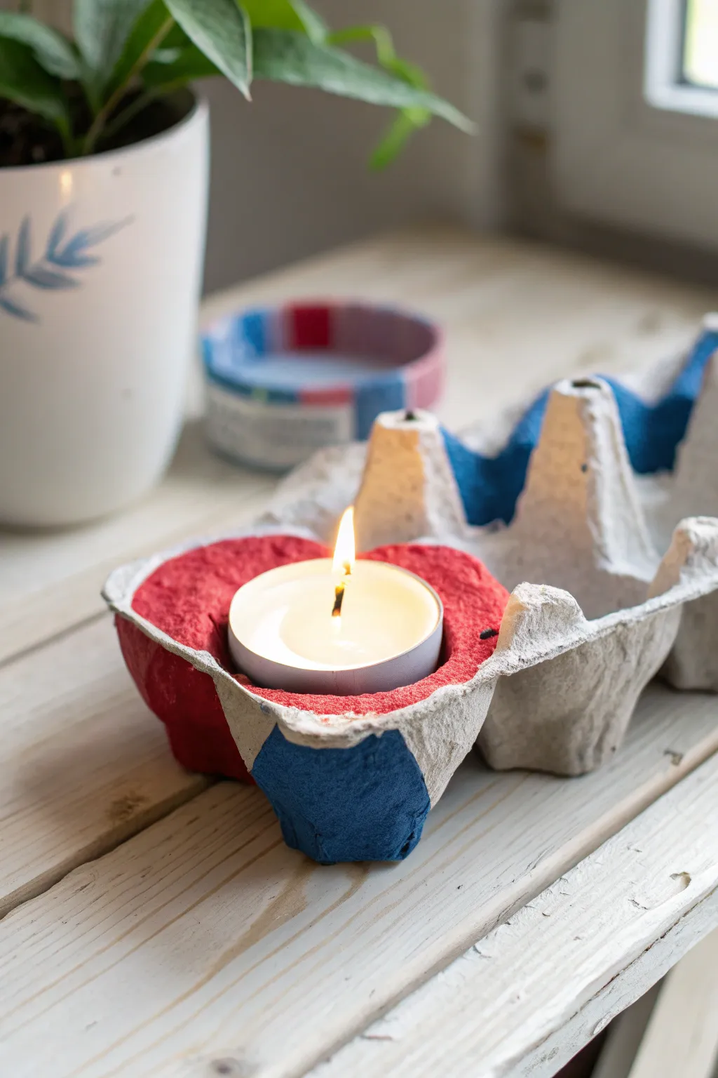 Transform egg cartons into stunning candle holders and bring a cozy glow to your space.