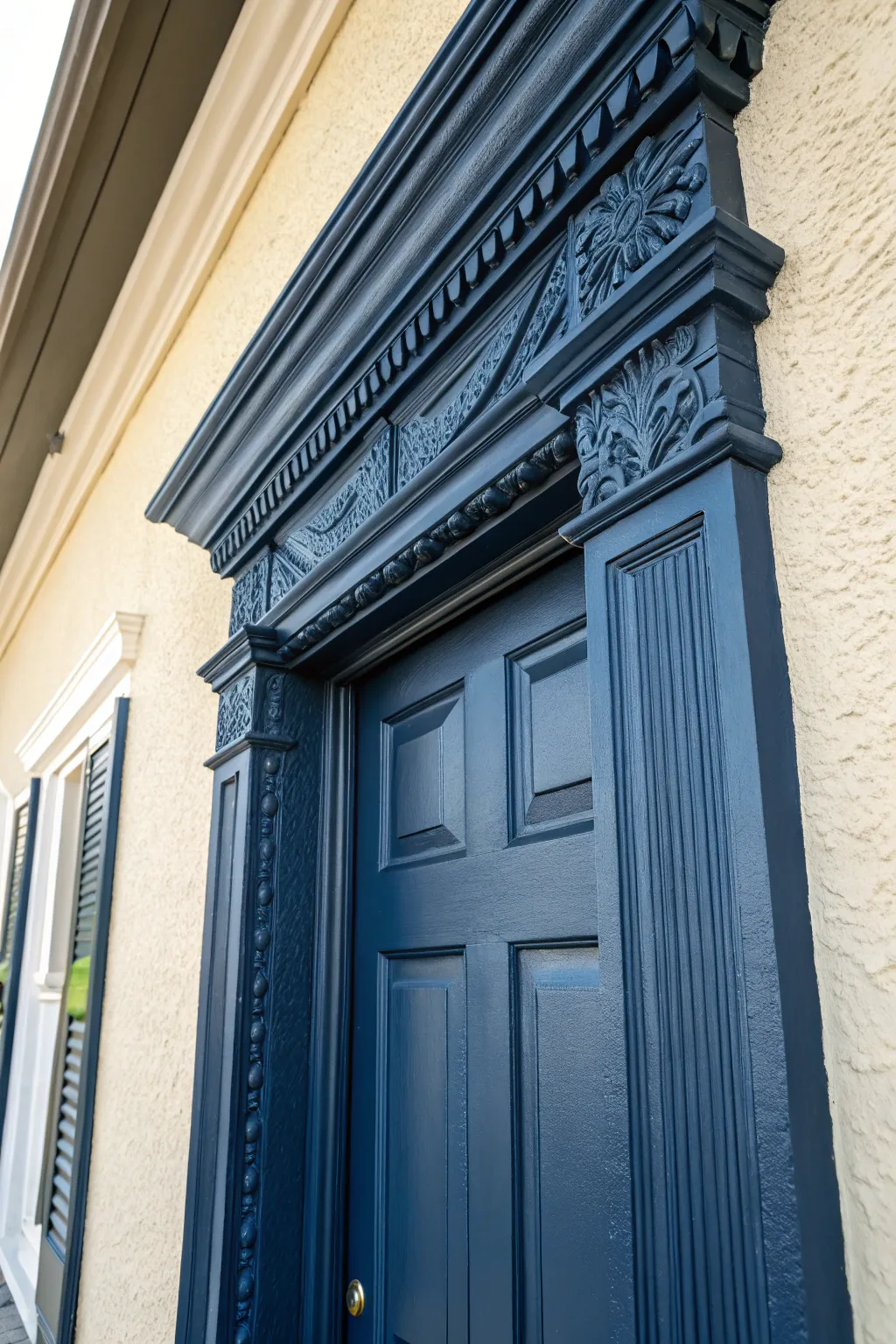 Elevate your interior with striking contrasts: Navy trim meets light walls for a bold farmhouse statement.
