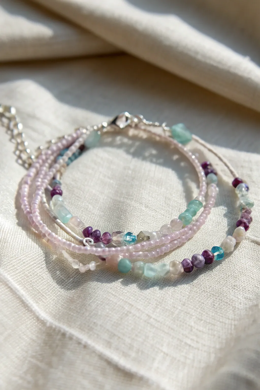 Embrace effortless elegance with this multi-strand gemstone chip bracelet—where minimalist design meets bohemian charm.