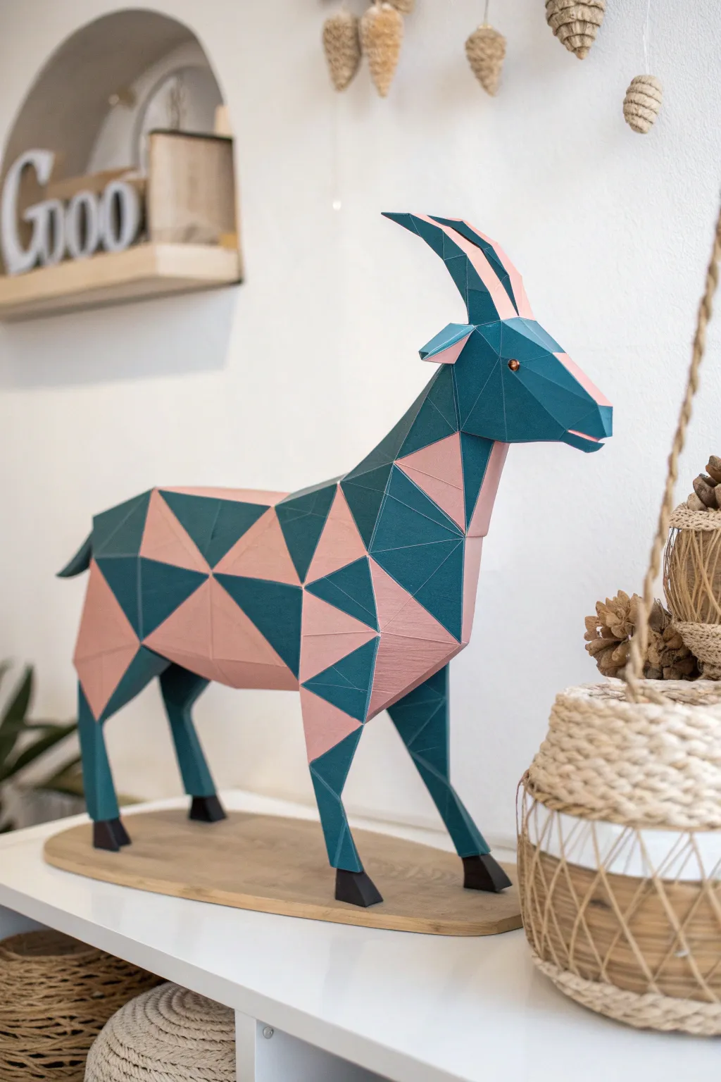 Transform simplicity into charm with this geometric goat craft, where minimalist elegance meets bold hues!