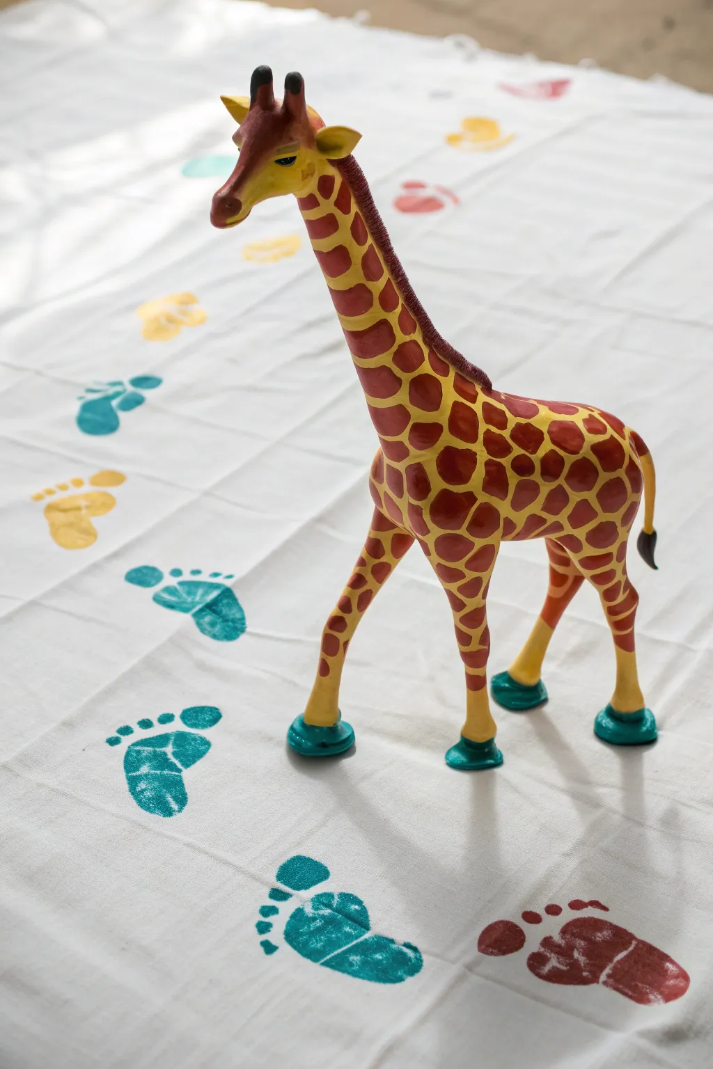 Capture the magic of creative play with vibrant animal footprint art!