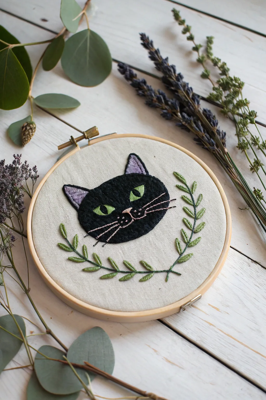 Spellbinding Stitches: Capture the charm of Halloween with this enchanting black cat embroidery.
