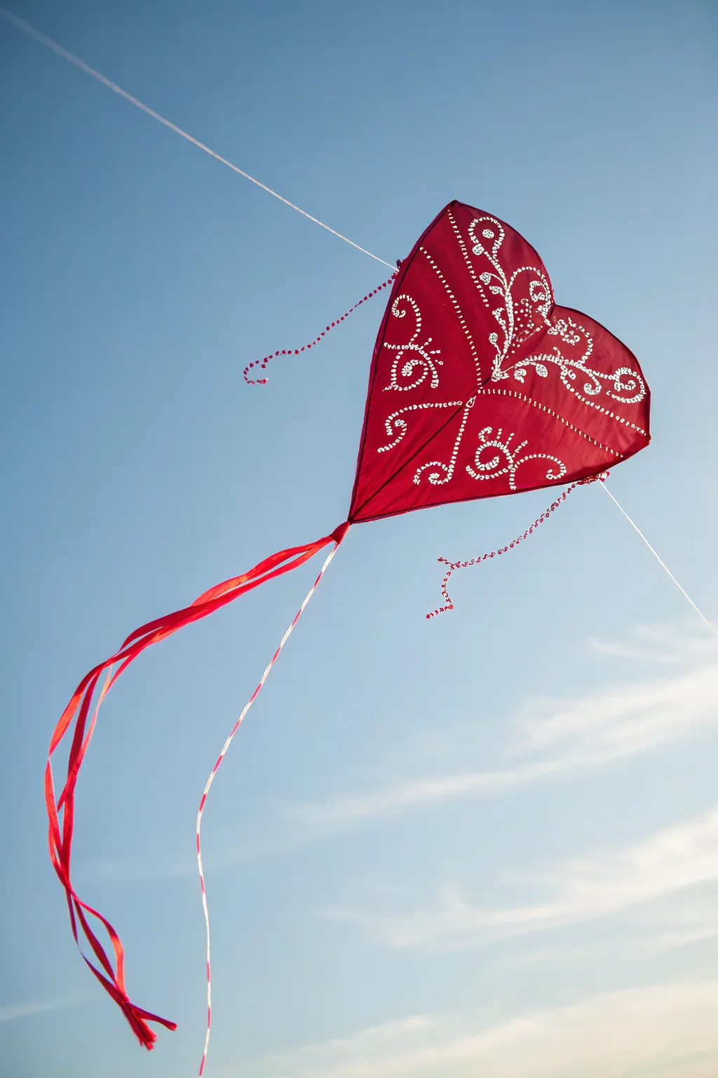 Let your heart soar with this beautifully crafted kite, where simplicity meets romance in the sky.