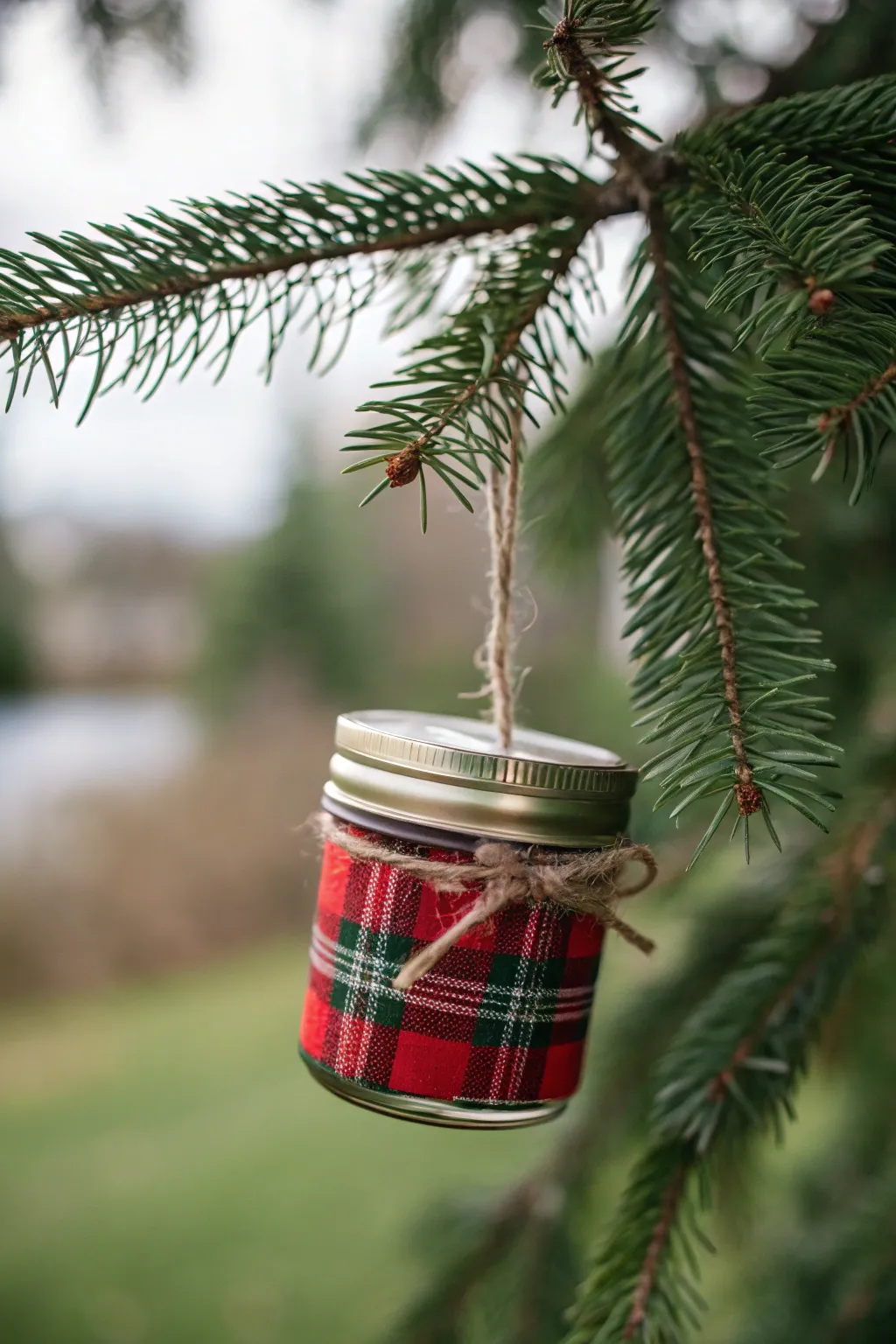 Plaid Perfection: Elevate your holiday decor with this charming plaid mason jar lid ornament.