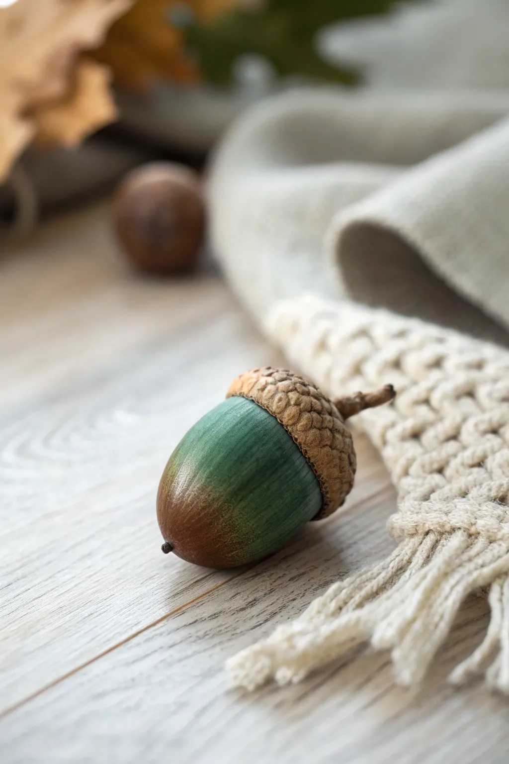 Embrace the season with a stunning ombre acorn, a nod to nature's palette.