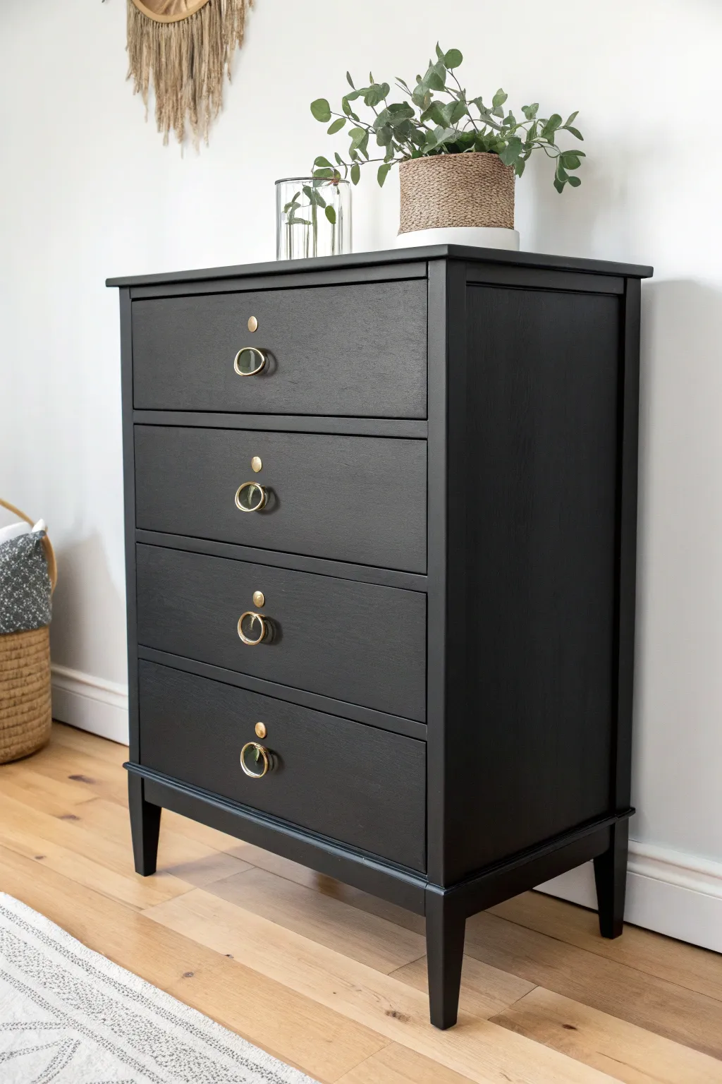 Embrace timeless sophistication with a classic black chest of drawers—a perfect blend of modern elegance and boho flair.