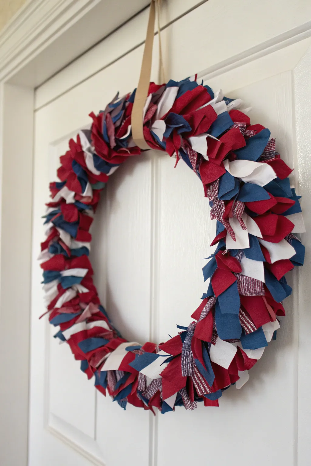 Transform fabric scraps into a stunning patriotic wreath that blends simplicity with bold aesthetics.