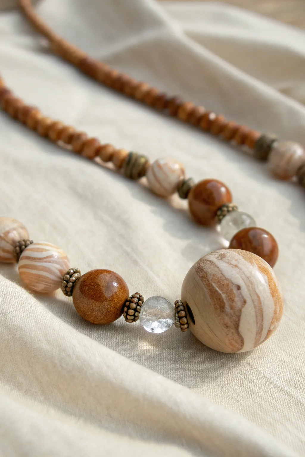 Elevate your style with this mixed media masterpiece, where polymer clay meets natural beauty.