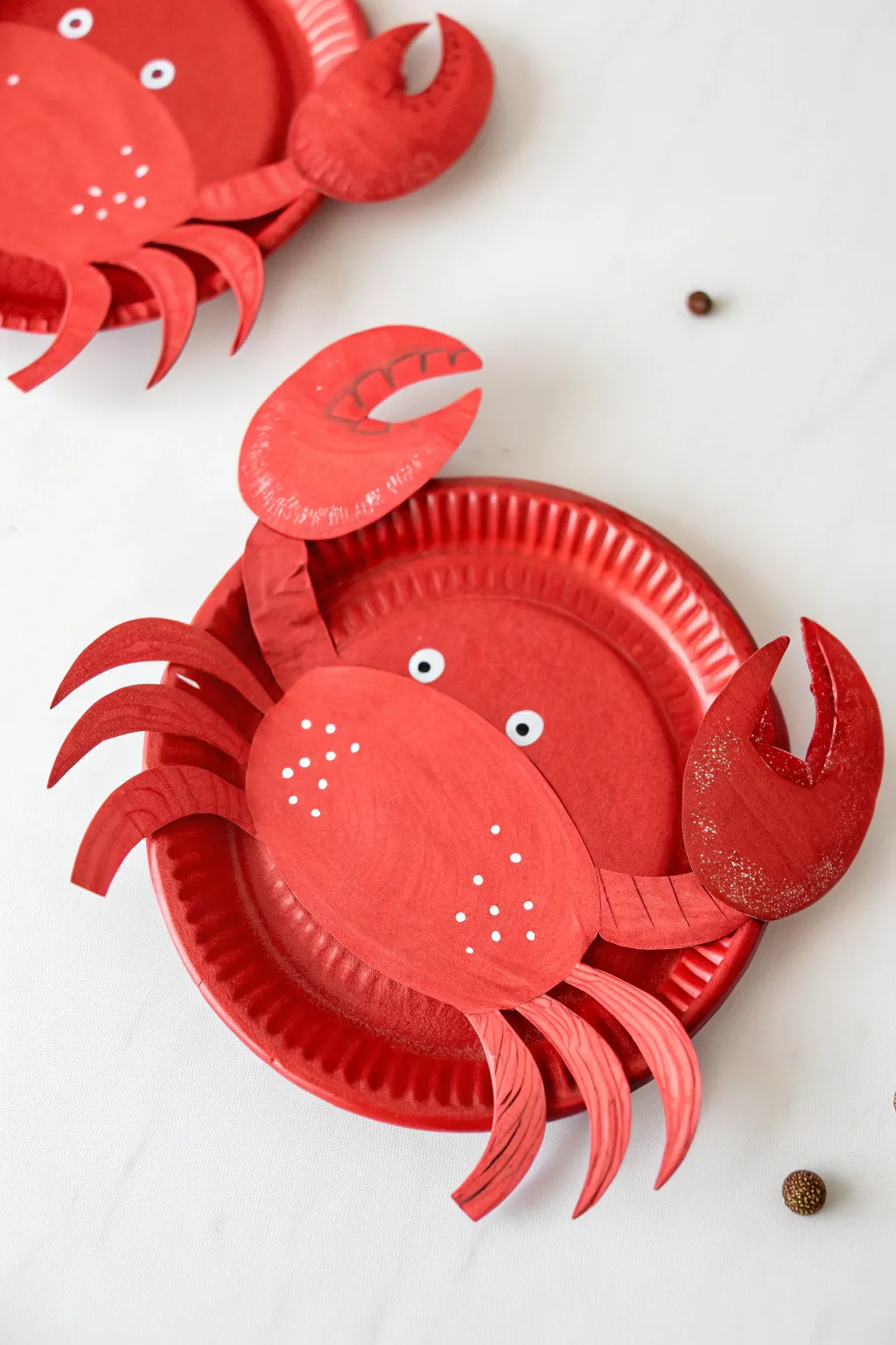 Dive into creativity with this charming crab craft, where simplicity meets bold color for a standout nautical-themed decoration.