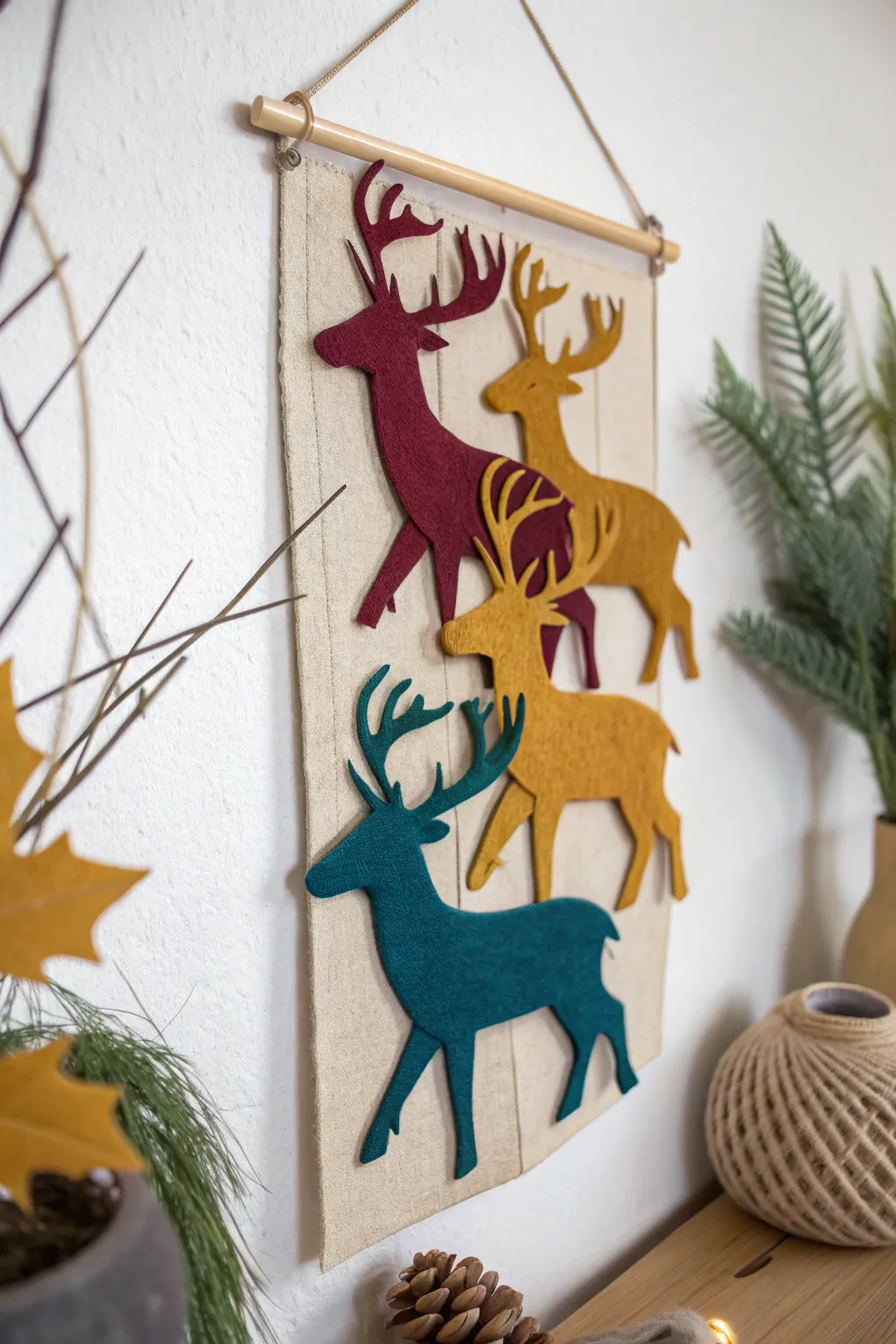 Transform your space with a handcrafted felt reindeer wall hanging—where Scandinavian simplicity meets Boho charm.