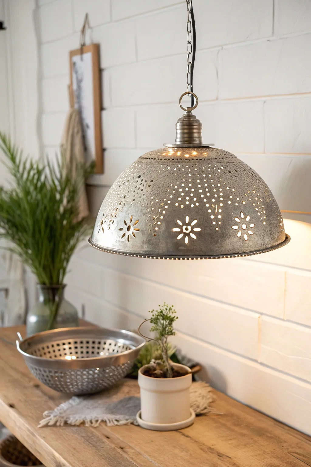 Illuminate your space with creativity: a colander turned into a chic lamp, casting magical patterns for a cozy boho-minimalist vibe.