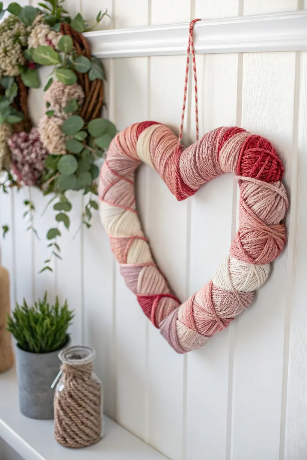 Add a pop of love to your decor with this Yarn-Wrapped Heart wreath, perfect for a minimalist Valentine's touch.