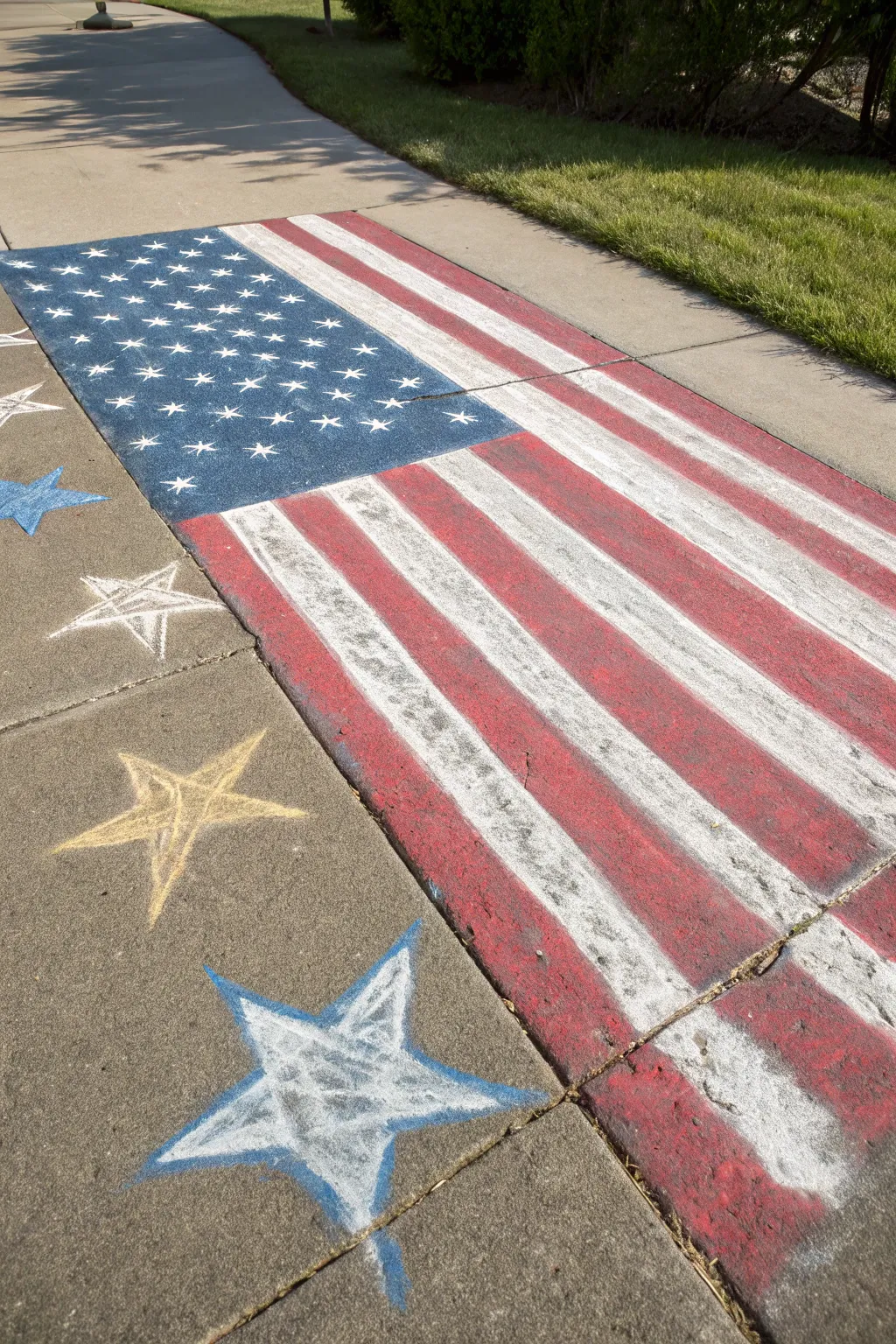 Celebrate with style: A minimalist yet vibrant chalk art American flag that captures the essence of craftsmanship and natural beauty.