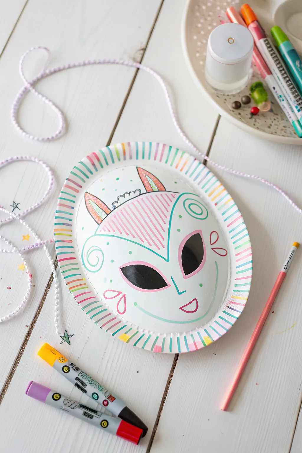 Unleash your creativity with these charming DIY alien masks, perfect for a cosmic-themed gathering!