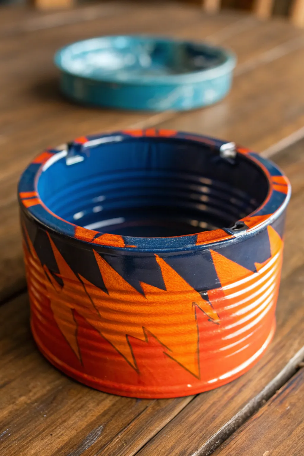 Transform your old tools into statement pieces: Upcycled paint can ashtray for a bold, artistic touch.
