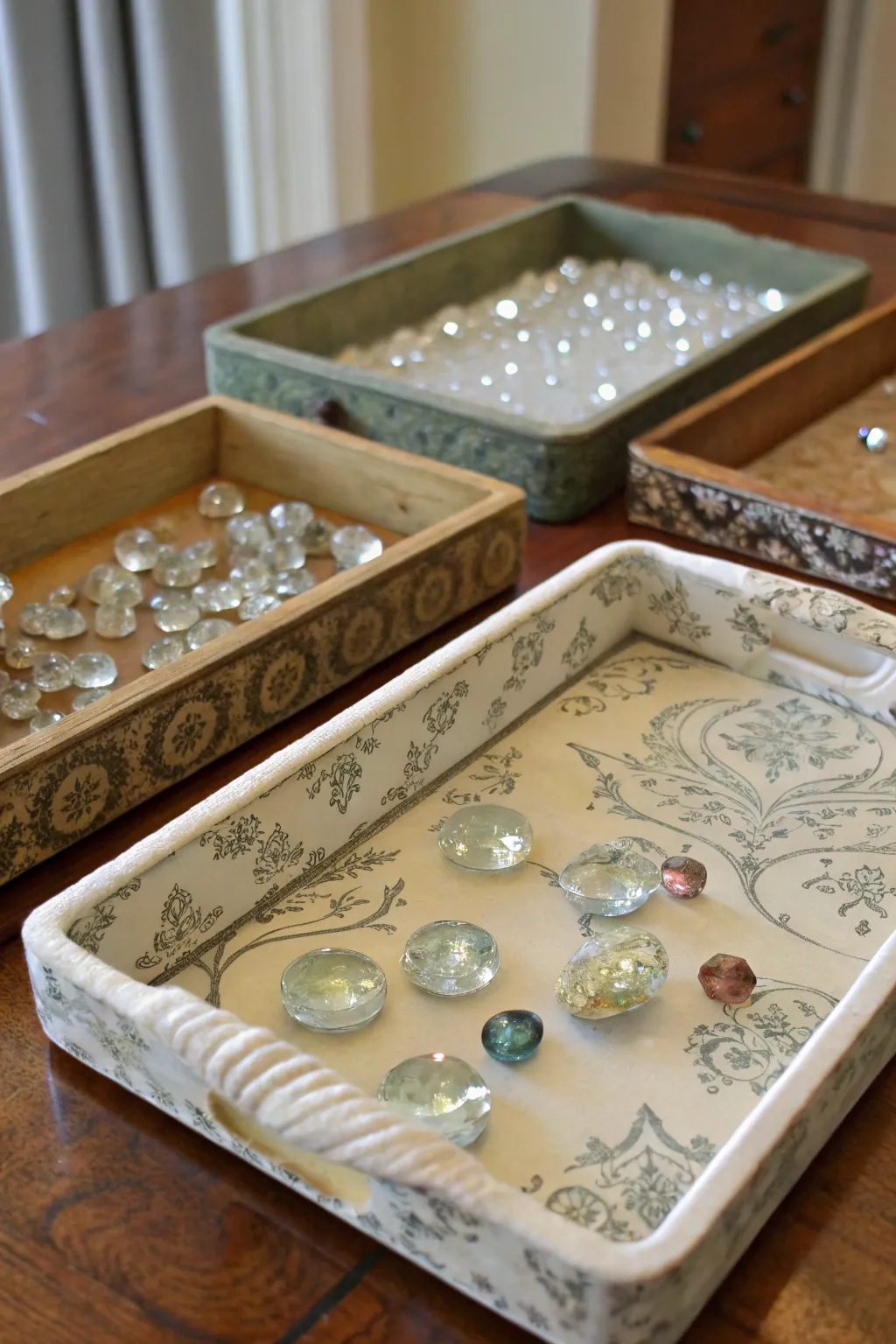 A personalized DIY crystal storage solution using vintage trays.