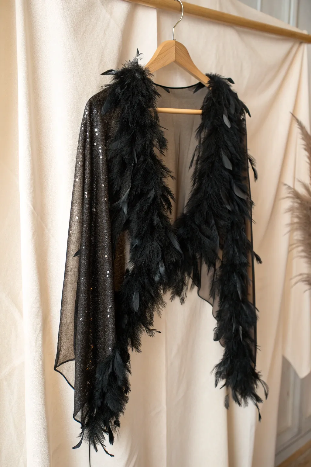Elevate your dark angel look with the mystique of a feathered shawl.