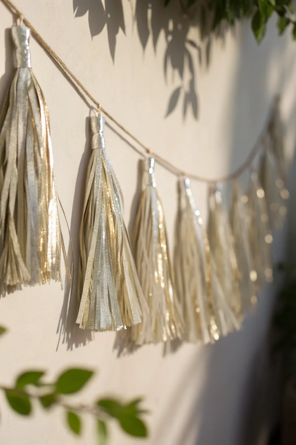 Add a touch of sparkle and elegance with a handcrafted mylar tassel garland, perfect for any festive occasion.
